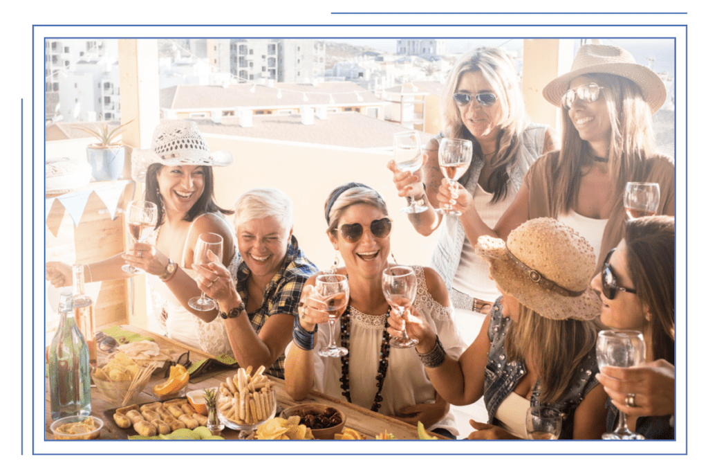 group of women drinking wine